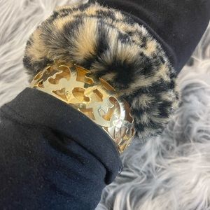 Gold color bangle with clasp